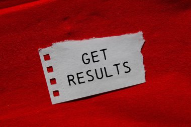 Get results message written on ripped torn paper piece on red background. Conceptual get results symbol. Copy space. clipart