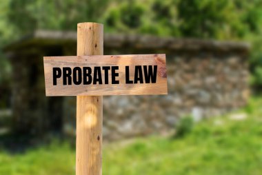 Probate law message written on wooden sign with blurry nature background. Conceptual probate law symbol. Copy space. clipart