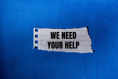 Mavi arkaplanlı yırtık kağıt parçasına yardım mesajınız gerekiyor. Kavramsal olarak yardım sembolüne ihtiyacımız var. Boşluğu kopyala.