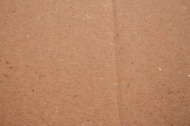 Arkaplan olarak soyut kahverengi karton kağıt dokusu