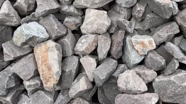 Gri taşlar arka plan, doku. Taş duvardaki gri taşlar.