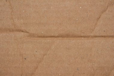 Soyut buruşmuş kahverengi karton kağıt doku arkaplan tasarım elementi