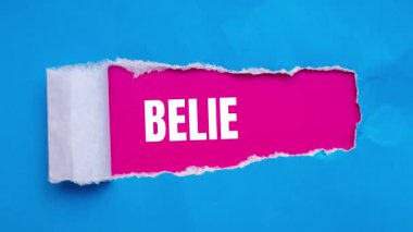 Believe message written on ripped torn paper background. Conceptual Believe symbol.