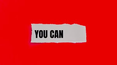 You Can Do It message written on ripped torn paper background