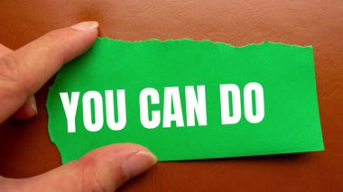 You Can Do It message written on ripped torn paper background. Conceptual You Can Do It symbol.