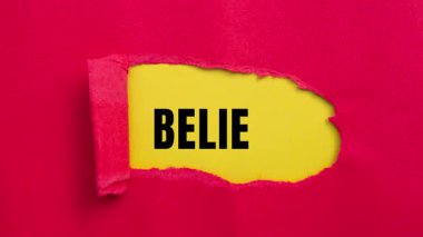 Believe message written on ripped torn paper background. Conceptual Believe symbol.