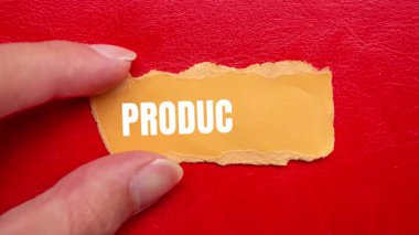 Productivity message written on ripped torn paper background