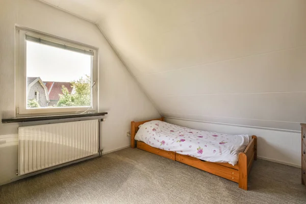 stock image Interior of contemporary bedroom with white walls and open bathroom in attic of house