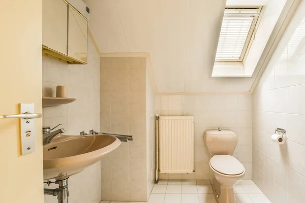 Flush Toilet Small Sink Corner Lavatory Room Beige Tile — Zdjęcie stockowe
