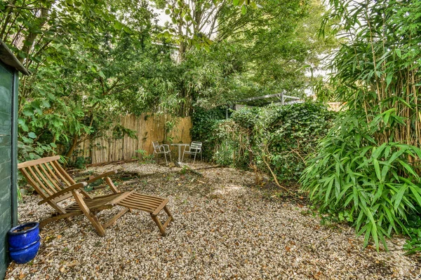 Neat Powerful Patio Sitting Area Small Garden Wooden Fence — Stock Fotó