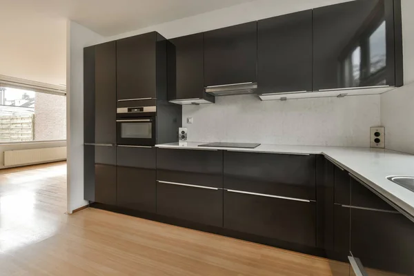 Modern Kitchen Black Cabinets White Counter Tops Island Room Very — 스톡 사진