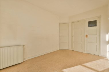 an empty room with no one on the wall or ceiling, its very clean and ready to use