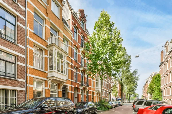 Amsterdam Hollanda Nisan 2021 Üzerinde Binalar Ağaçlar Mavi Gökyüzü Olan — Stok fotoğraf