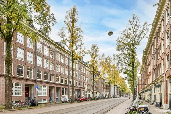 Amsterdam Netherlands April 2021 City Street Parked Motorcycles Side Trees — Stock Photo, Image