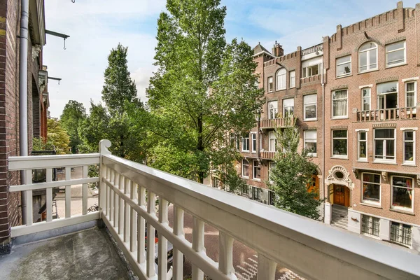 Amsterdam Netherlands April 2021 Balcony Trees Buildings Background Taken Apartment — Foto de Stock