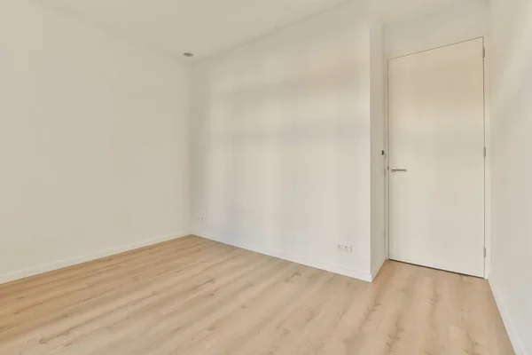 Empty Room White Walls Wood Flooring Door Front Wall Right — Stockfoto
