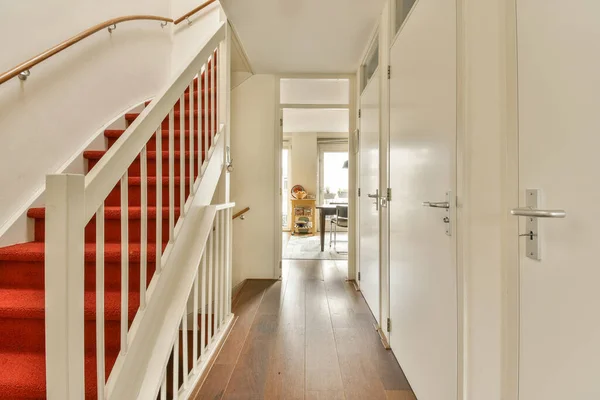 Hallway Red Carpet Floor Wooden Stairs Leading Open Door Leads — Stock Photo, Image
