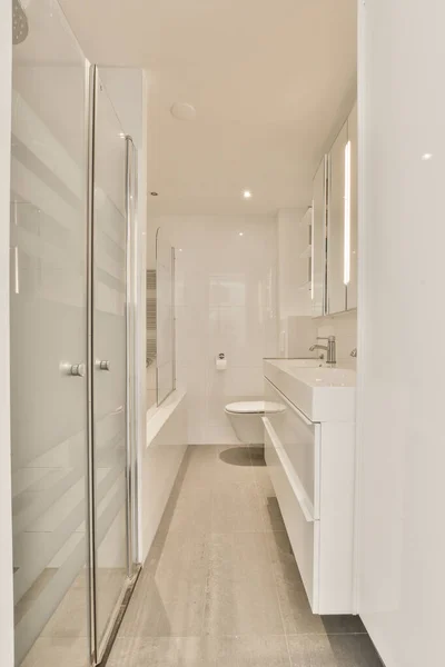 Bathroom White Walls Wood Flooring Shower Area While Glass Doors — Stock Photo, Image