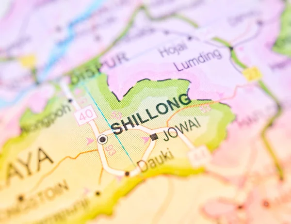 Shillong on a map of India with blur effect.