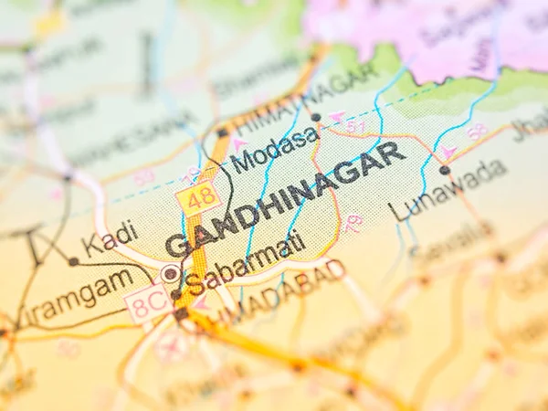 Gandhinagar on a map of India with blur effect.