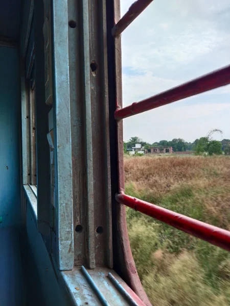 Outside view from window inside the Indian railways train