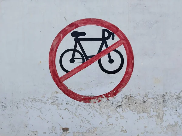 not allowed cycle sign board on wall. Sign cycling prohibited, Fobidden to Bike