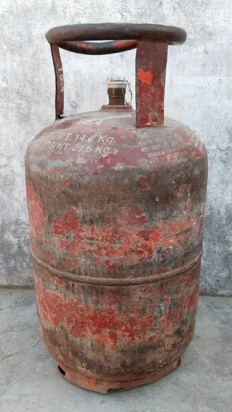 Indian Domestic LPG Gas Cylinder or Domestic Cooking gas Cylinder on land, gas cylinder on surface with spac