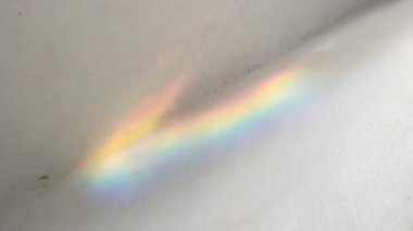 Natural rainbow on the wall in the house. Refraction of light