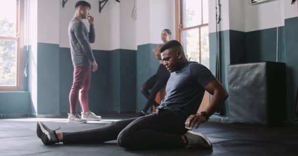 African American Athlete Stretches Fitness Studio High Quality Footage — Stock Video