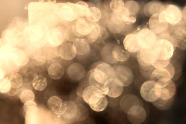 Golden Abstract bokeh light effect on background