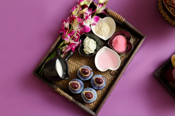 Stock image Top view of Skin care products. Sea salt, essential oil and treatment body scrubs in basket.