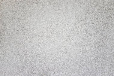Beyaz arka plan dokusu. Duvar kağıdı şeklinde ve metin için kopyalama alanı var. Doku arkaplanı için boş beton duvar beyaz rengi.