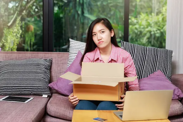 Woman feel disappointed after received damaged item or unwanted stuff. Annoyed customers dissatisfied by delivery service.