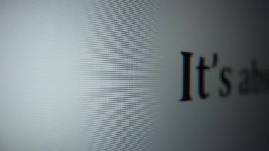 Its absolutely boiling. Moving text on a computer monitor close-up