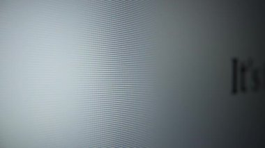Its freezing. Moving text on a computer monitor close-up
