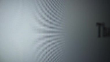 That s terrible. Moving text on a computer monitor close-up