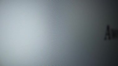 Awesome. Moving text on a computer monitor close-up