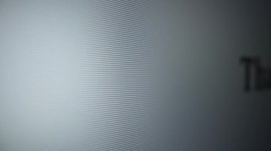 That s for sure. Moving text on a computer monitor close-up