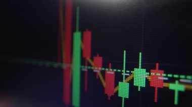 Monitördeki kripto para birimi oranının grafiği. Dolly vurdu. Siyah arkaplan