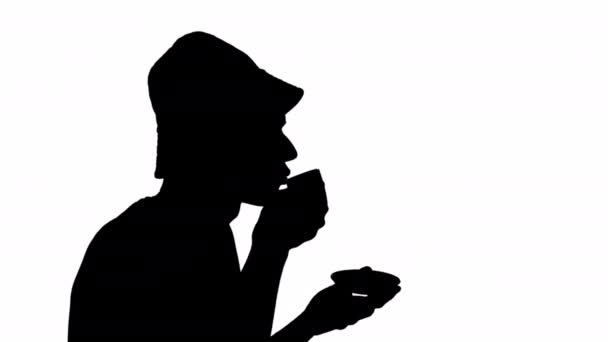 Silhueta Preta Homem Bebendo Uma Xícara Fundo Branco Máscara Preto — Vídeo de Stock