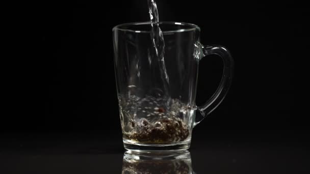Pour Boiling Water Glass Mug Black Tea Slow Motion — Stock Video