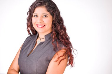 worker professional hispanic woman in white background with copy space. looking at camera. corporate face portrait. entrepreneur