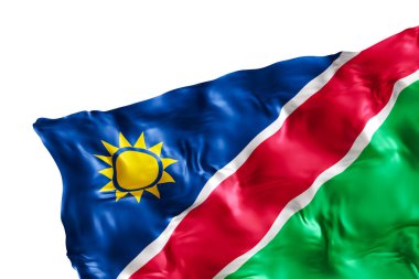 Beyaz arka planda izole edilmiş kıvrımlı, gerçekçi Namibya bayrağı. Dipnot, köşe tasarım elemanı. Kes şunu. Vatansever temalar ya da ulusal organizasyonlar için mükemmel. Boşluk, kopyalama alanı. 3 Boyutlu Hazırlama