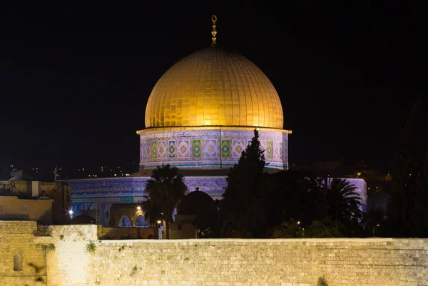 The Dome of the Rock ( , Qubbat a-akhra) is an Islamic shrine located on the Temple Mount in the Old City of Jerusalem. Night view.
