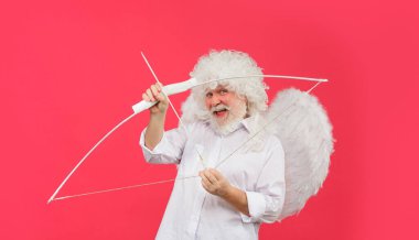 Happy Valentines Day. God of Love. Funny angel cupid aiming with bow and arrow. Symbol of love