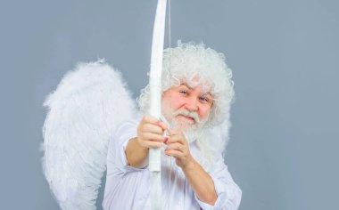 Valentines Day. Valentine cupid shooting arrow with bow. Bearded angel throws arrows of love