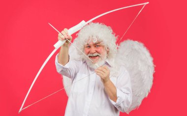 Valentines day cupid. Angel man in white wings with bow and arrows. Love concept