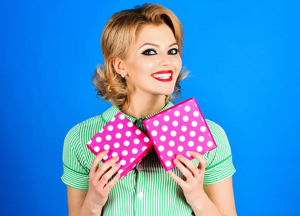 Smiling woman summer dress with gift box. Beautiful blonde girl with gifts boxes. Summer sale. Discount. Holidays celebration. Womens Day, Valentines day, birthday, anniversary. Shopping for holidays