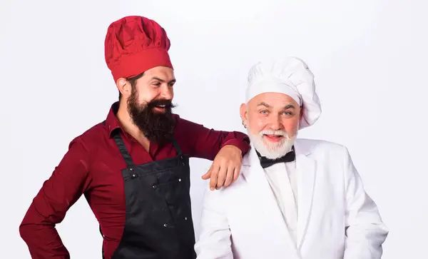 Due Cuochi Professionisti Che Preparano Pasti Nella Cucina Del Ristorante Immagini Stock Royalty Free