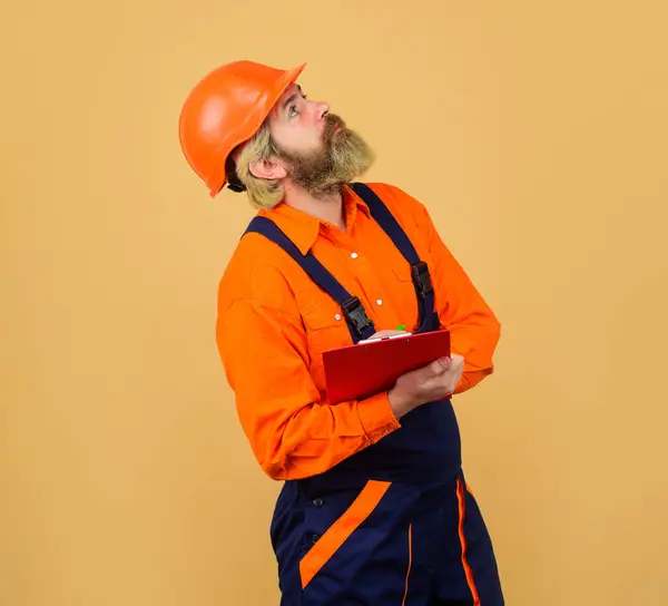 Male Builder Engineer Architect Uniform Safety Hard Hat Clipboard Inspection Stockbild
